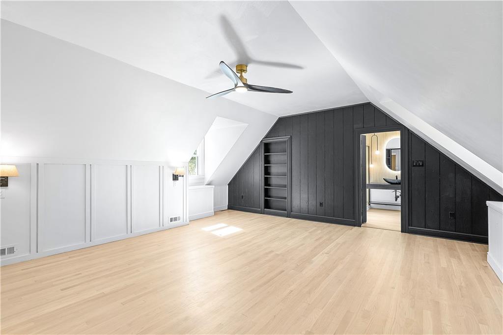 115 Elm Lane Coraopolis, PA 15108 - Photo 25 of 50 a view of an empty room with closet and a ceiling fan