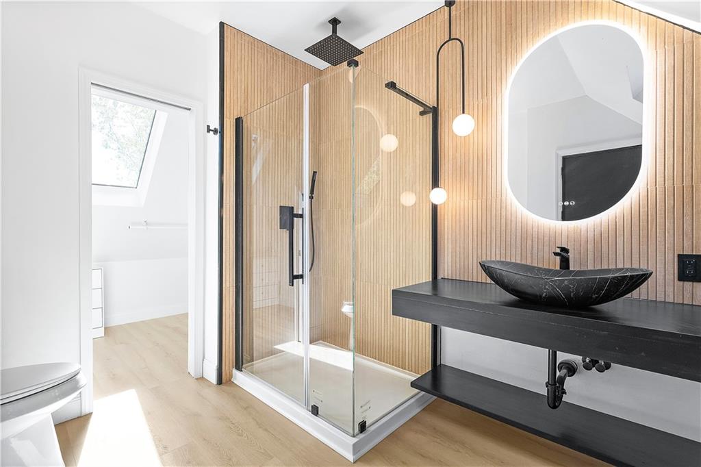 115 Elm Lane Coraopolis, PA 15108 - Photo 30 of 50 a bathroom with a sink a mirror and a shower