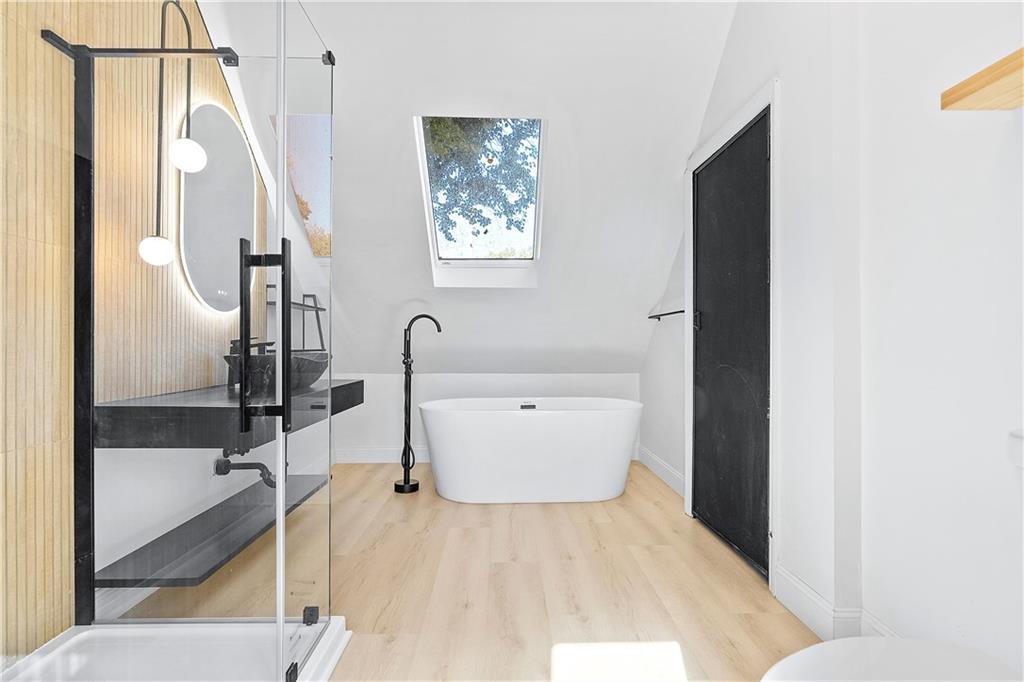 115 Elm Lane Coraopolis, PA 15108 - Photo 31 of 50 a bathroom with a bathtub and a shower