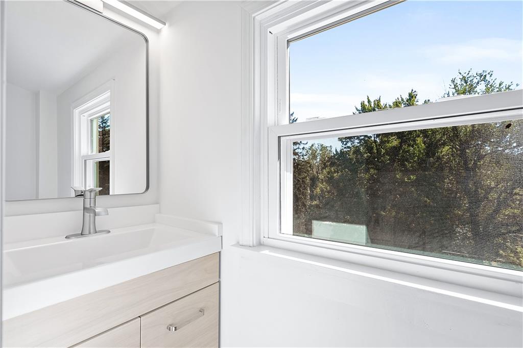 115 Elm Lane Coraopolis, PA 15108 - Photo 39 of 50 a view of a bathroom with a sink and mirror