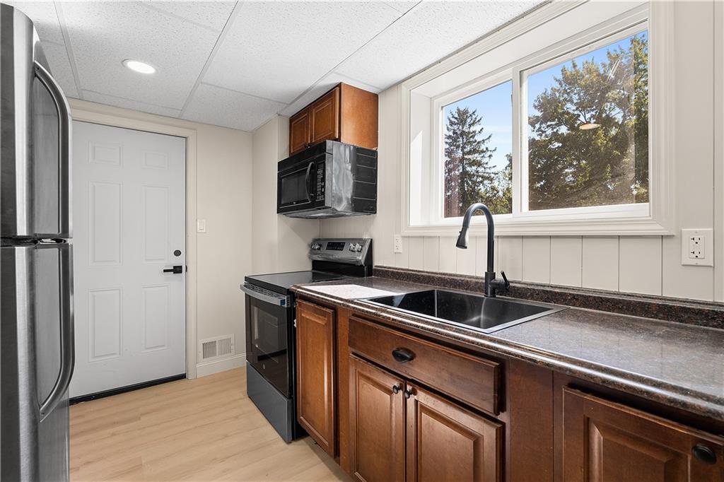 115 Elm Lane Coraopolis, PA 15108 - Photo 46 of 50 a kitchen that has a sink and a window
