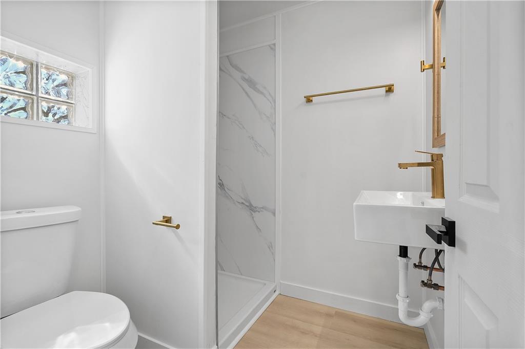 115 Elm Lane Coraopolis, PA 15108 - Photo 48 of 50 a bathroom with a toilet and a shower