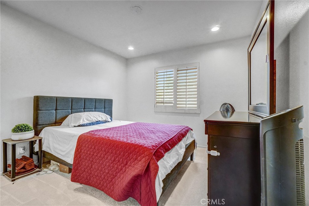 11 Brookhollow Irvine, CA 92602 - Photo 16 of 41 a bedroom with a bed and a window