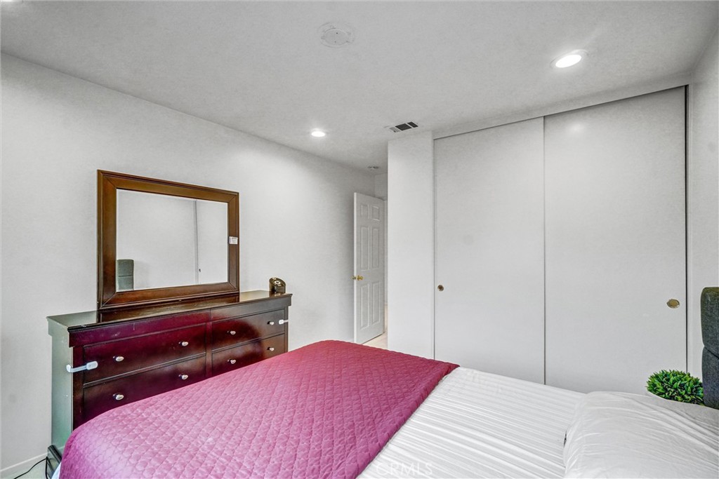 11 Brookhollow Irvine, CA 92602 - Photo 17 of 41 a bedroom with a bed and a dresser