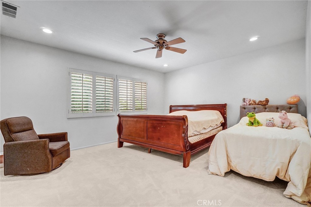 11 Brookhollow Irvine, CA 92602 - Photo 20 of 41 a bedroom with two beds and a couch