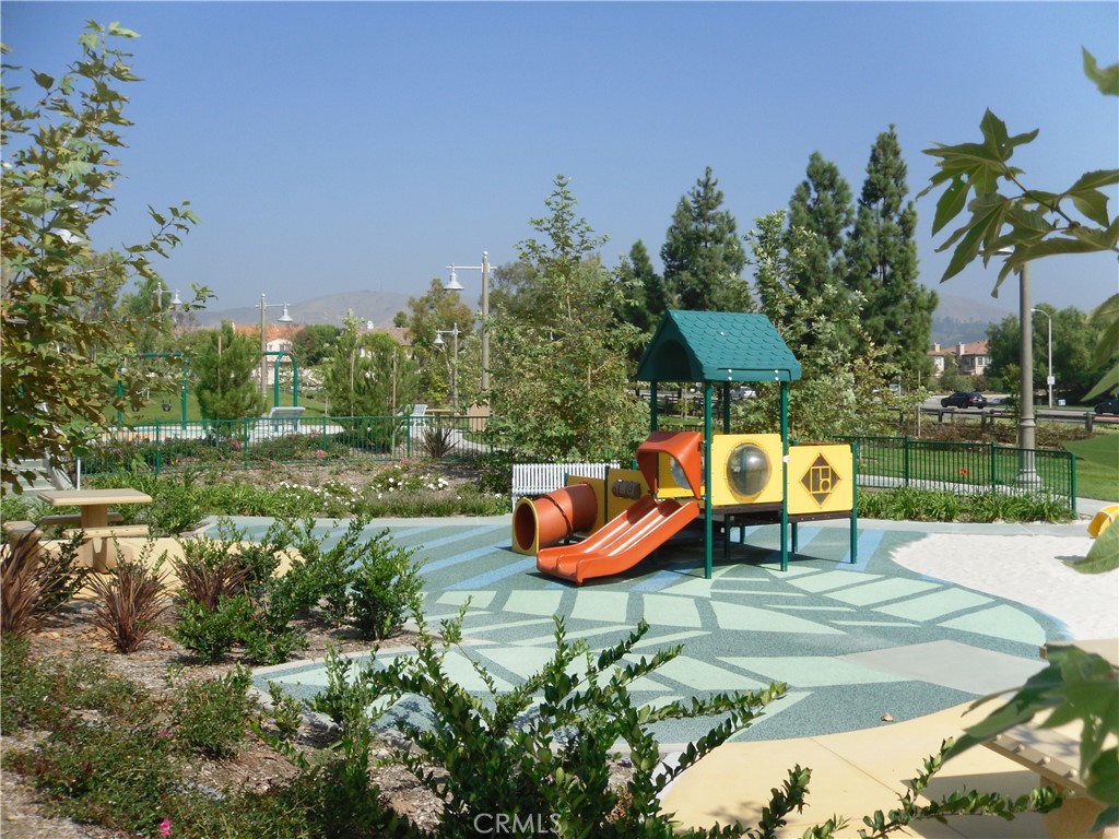 11 Brookhollow Irvine, CA 92602 - Photo 38 of 41 an outdoor sitting area with a lake view