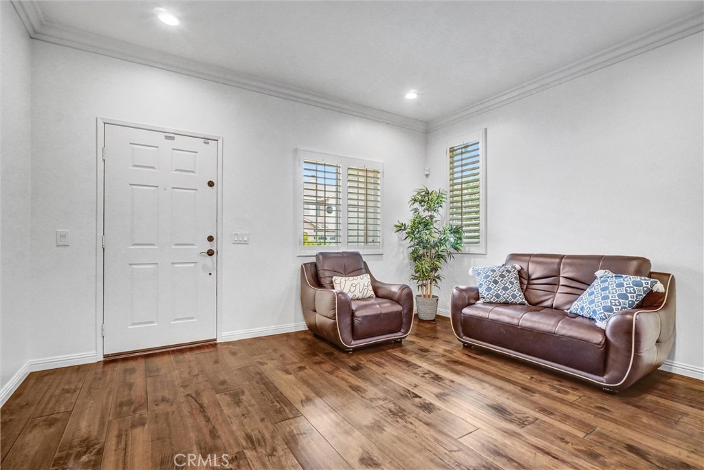 11 Brookhollow Irvine, CA 92602 - Photo 5 of 41 a living room with furniture window and wooden floor