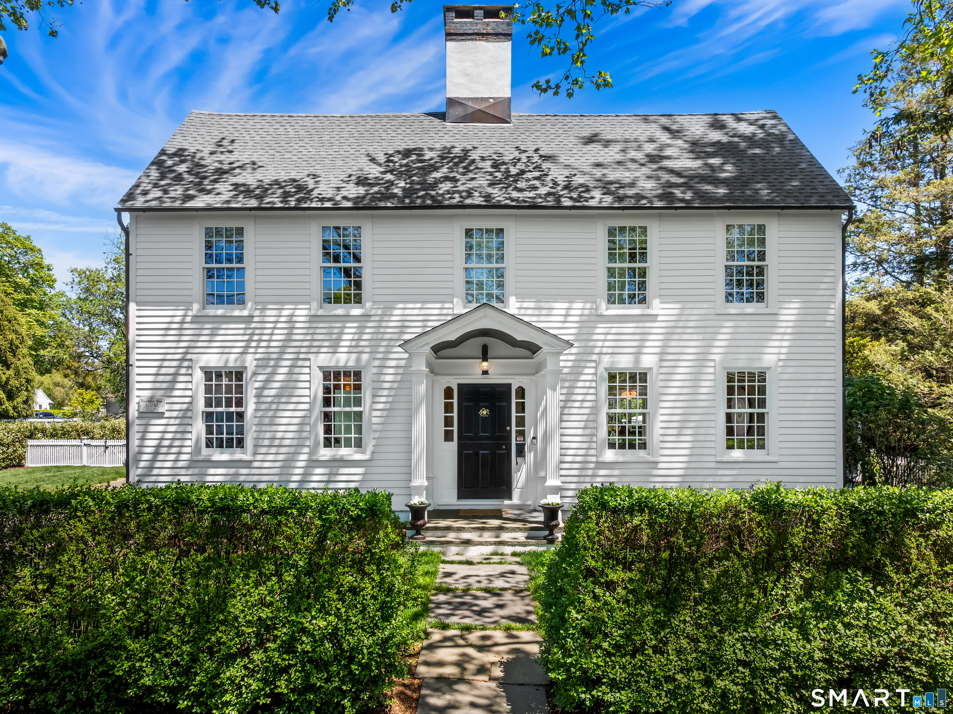349 Beach Road Fairfield, CT 06824 - Photo 1 of 40 front view of a house with a yard