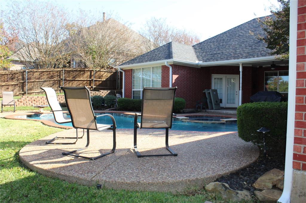 2131 Deer Run Denison, TX 75020 - Photo 13 of 35 a view of house with backyard and outdoor seating