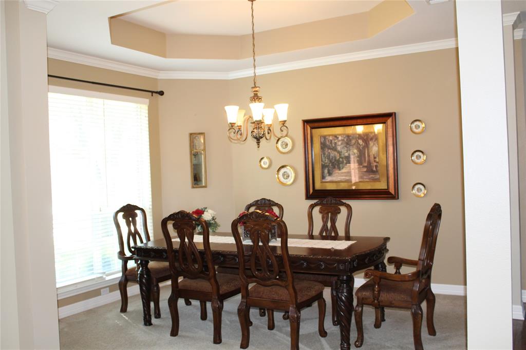 2131 Deer Run Denison, TX 75020 - Photo 14 of 35 a dining room with furniture and window