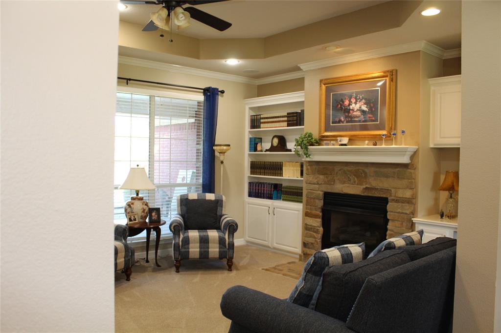 2131 Deer Run Denison, TX 75020 - Photo 15 of 35 a living room with furniture and a fireplace