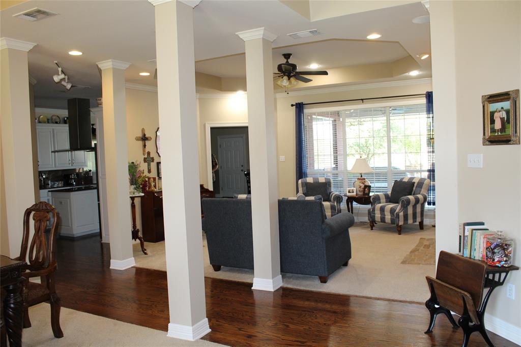 2131 Deer Run Denison, TX 75020 - Photo 17 of 35 a living room with furniture window and wooden floor