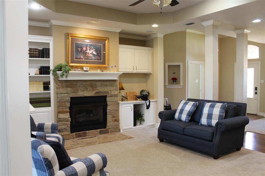 2131 Deer Run Denison, TX 75020 - Photo 18 of 35 a living room with furniture and a fireplace