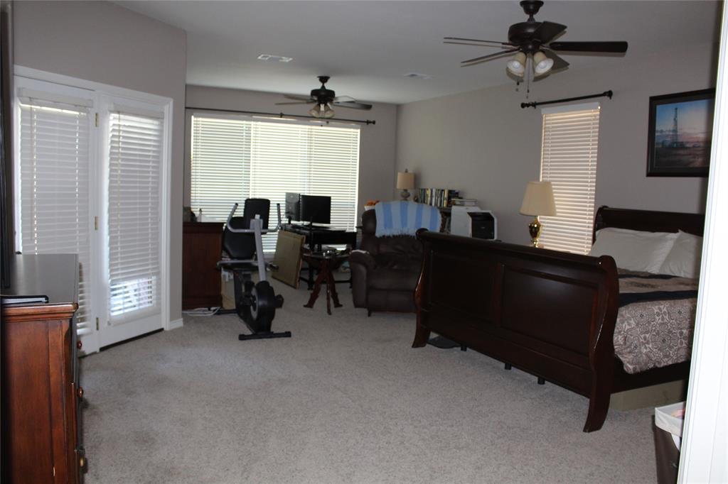 2131 Deer Run Denison, TX 75020 - Photo 27 of 35 a living room with furniture and a large window
