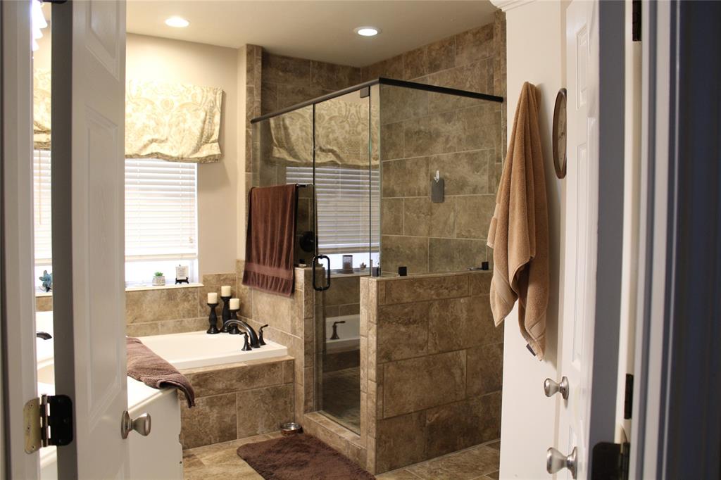 2131 Deer Run Denison, TX 75020 - Photo 29 of 35 a bathroom with a shower and a sink