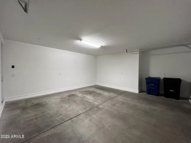 a house view with swimming pool and sitting space