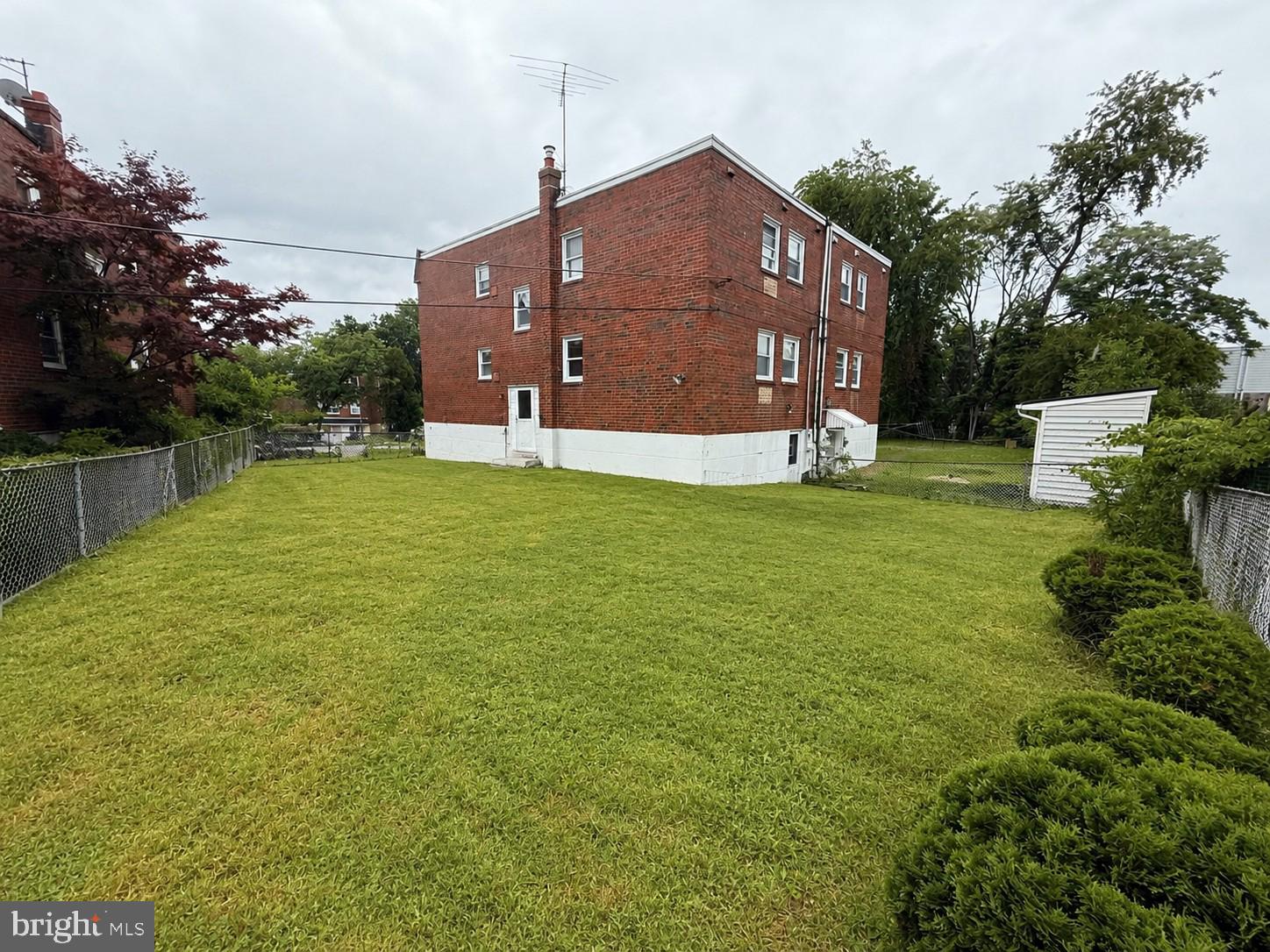 10838 Lockart Road Philadelphia, PA 19116 - Photo 16 of 16 shared backyard. AI enhanced.