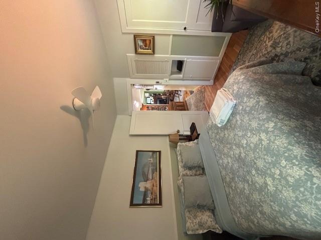 29 West Kerley Corners Road Red Hook, NY 12571 - Photo 16 of 39 a bedroom with a large bed and wooden floor