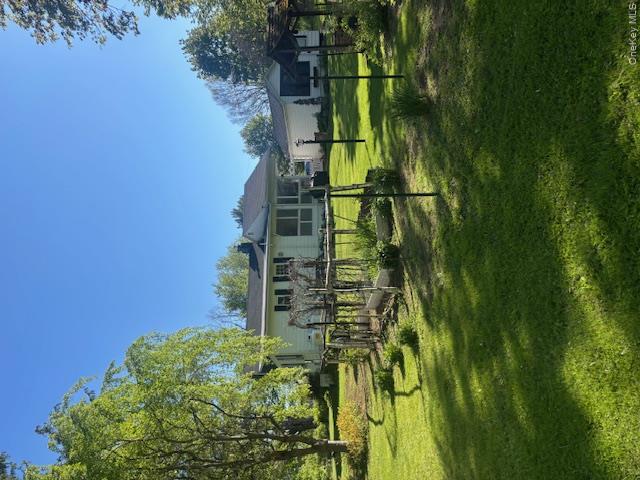 29 West Kerley Corners Road Red Hook, NY 12571 - Photo 27 of 39 a view of a big yard with a house in the background