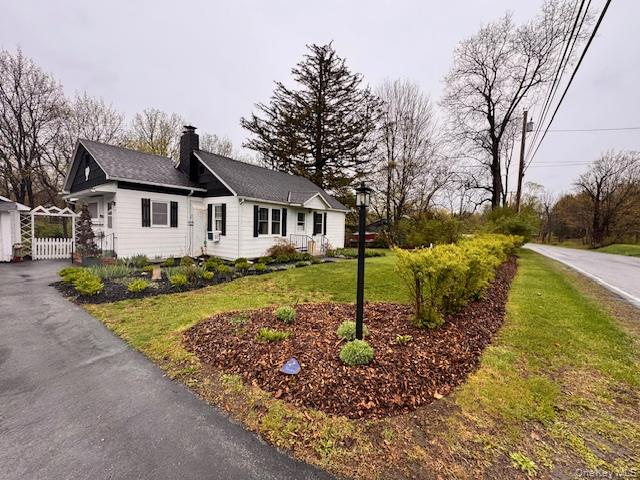 29 West Kerley Corners Road Red Hook, NY 12571 - Photo 3 of 39 a front view of a house with garden