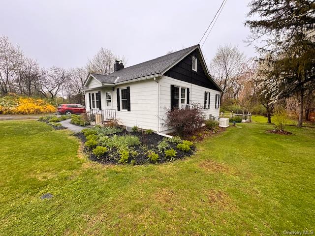 29 West Kerley Corners Road Red Hook, NY 12571 - Photo 5 of 39 a front view of house with yard and trees around