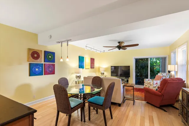 a living room with furniture fireplace and a flat screen tv