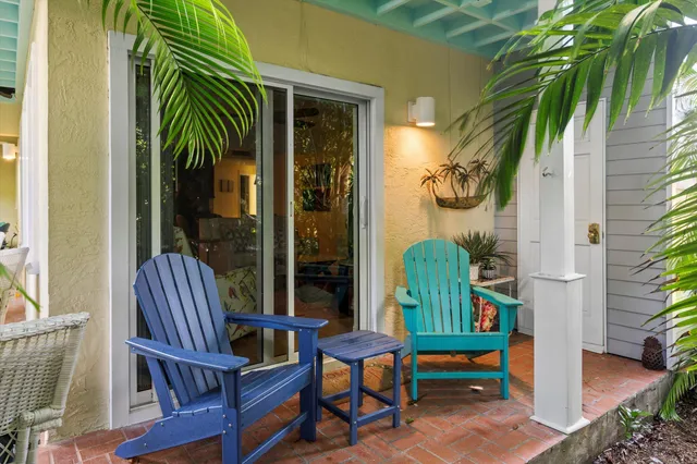 a kitchen with stainless steel appliances a refrigerator stove and microwave