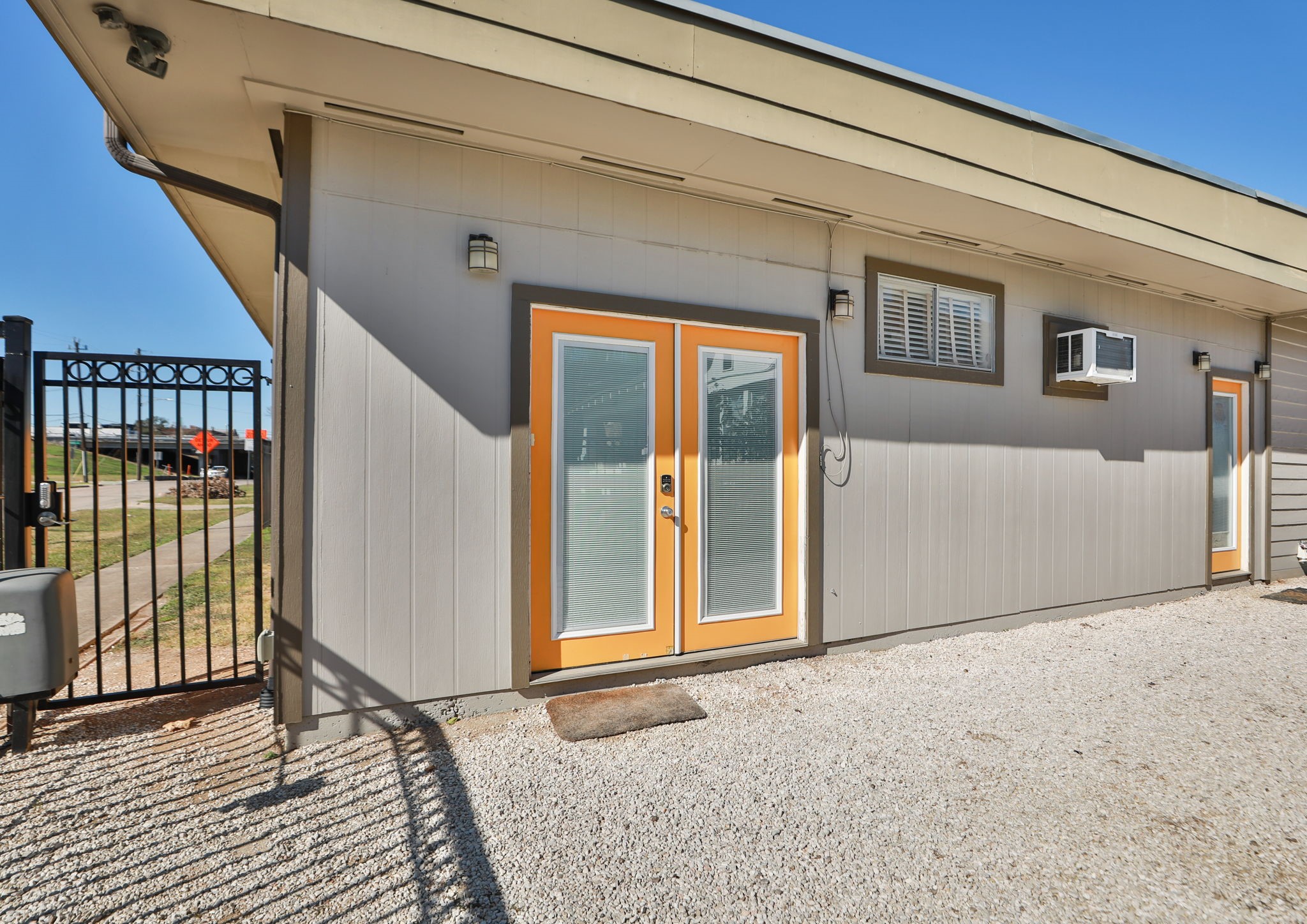 2215 Cleburne Street Houston, TX 77004 - Photo 3 of 21 a view of a room with wooden floor and windows