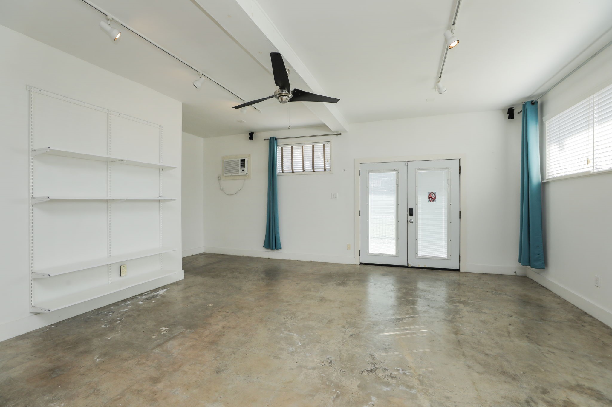 2215 Cleburne Street Houston, TX 77004 - Photo 6 of 21 a view of an empty room with a window