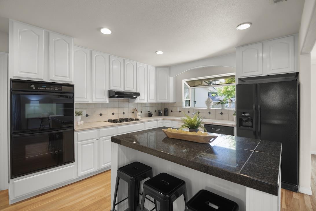 2510 Villanova Road San Jose, CA 95130 - Photo 7 of 21 a kitchen with a sink refrigerator and cabinets