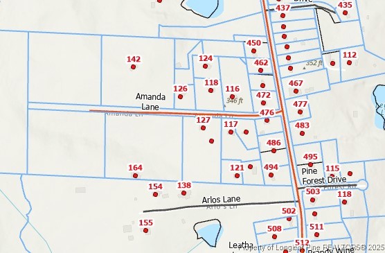 180 Amanda Lane Rockingham, NC 28379 - Photo 24 of 25 a white refrigerator with white cabinets