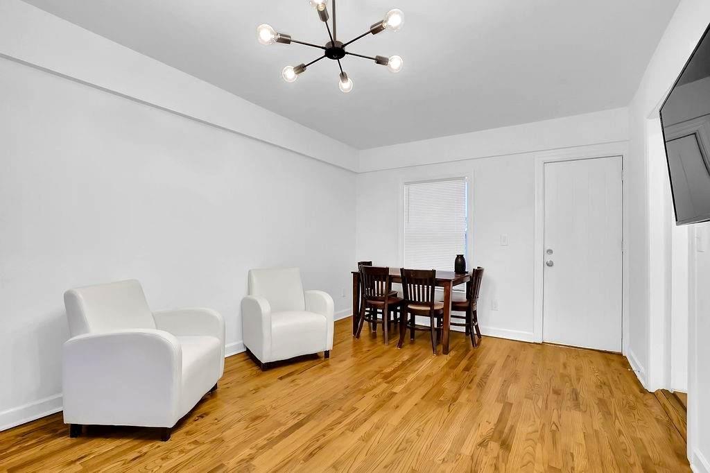 1124 Longshore Drive Decatur, GA 30032 - Photo 15 of 18 a view of a livingroom with furniture and wooden floor