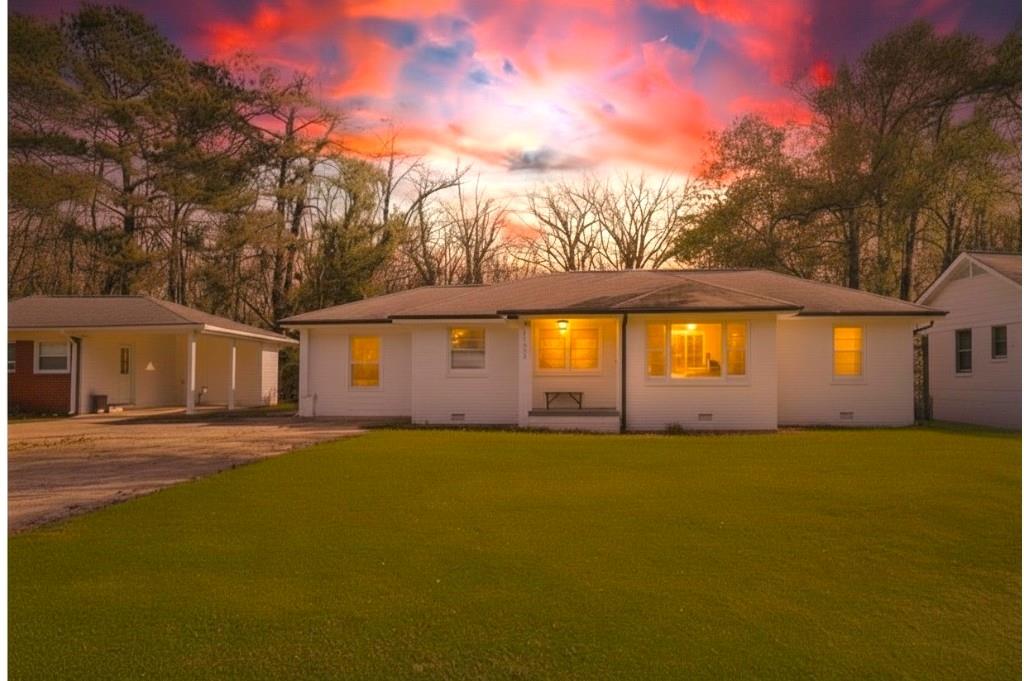 1124 Longshore Drive Decatur, GA 30032 - Photo 2 of 18 a view of an ocean with house in the background