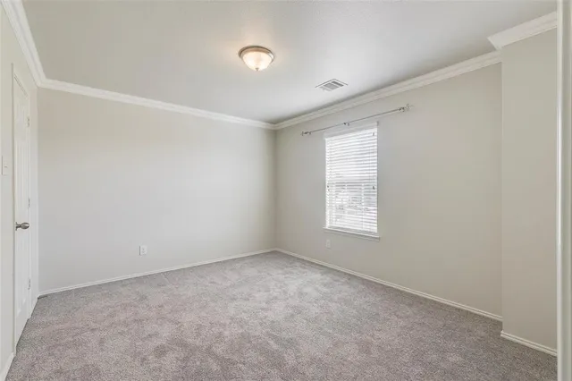 a bathroom with a sink a toilet and a large mirror
