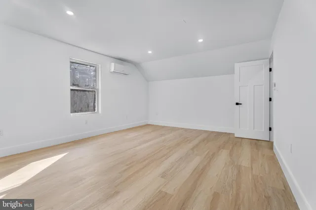 a utility room with sink dryer and washer