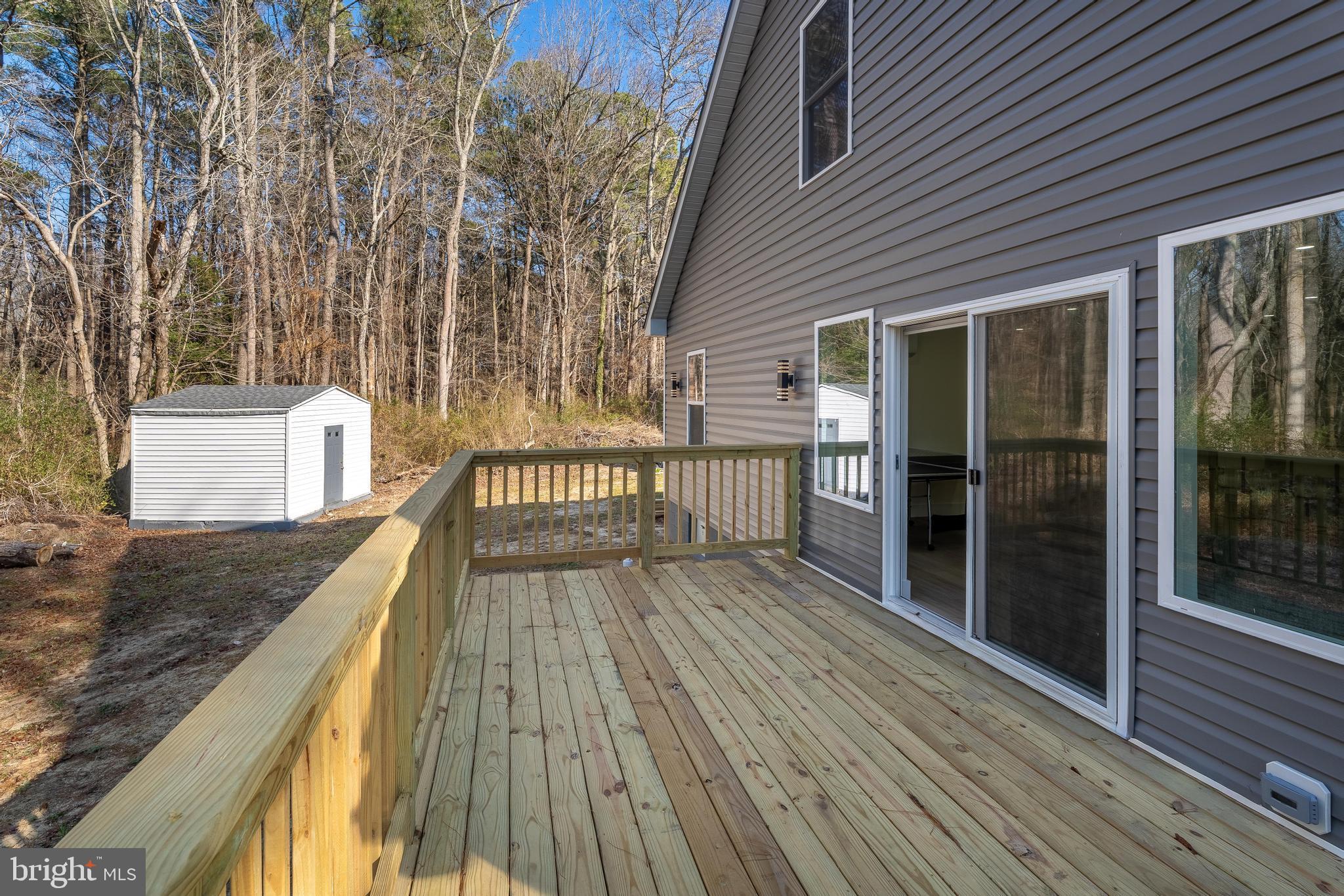 10231 Henry Road Berlin, MD 21811 - Photo 56 of 68 Beand new. back deck off the living area!