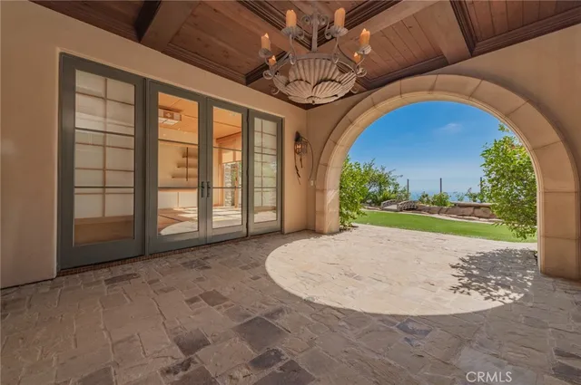 a view of a balcony with wooden floor