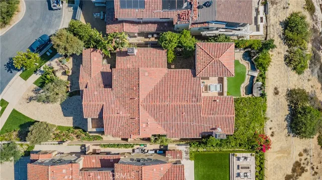 a view of a field with mountains in the background