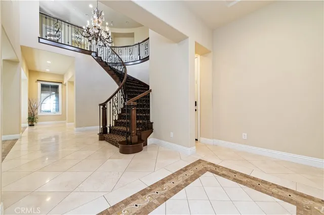 a view of entryway and hall with a front door