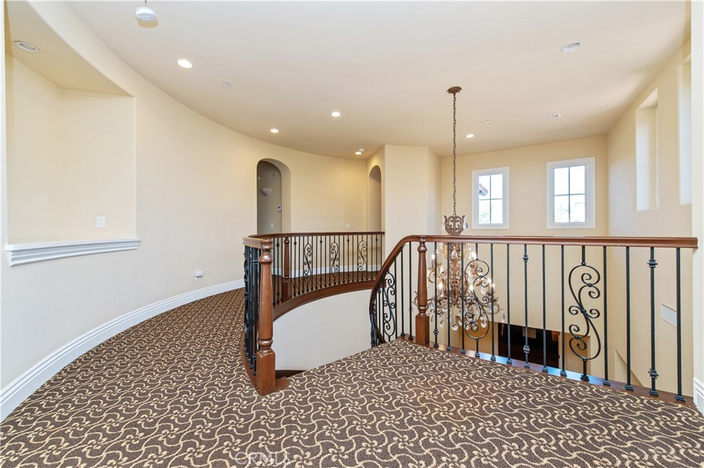 4 Starcatcher Newport Coast, CA 92657 - Photo 9 of 23 a view of entryway and hall with wooden floor