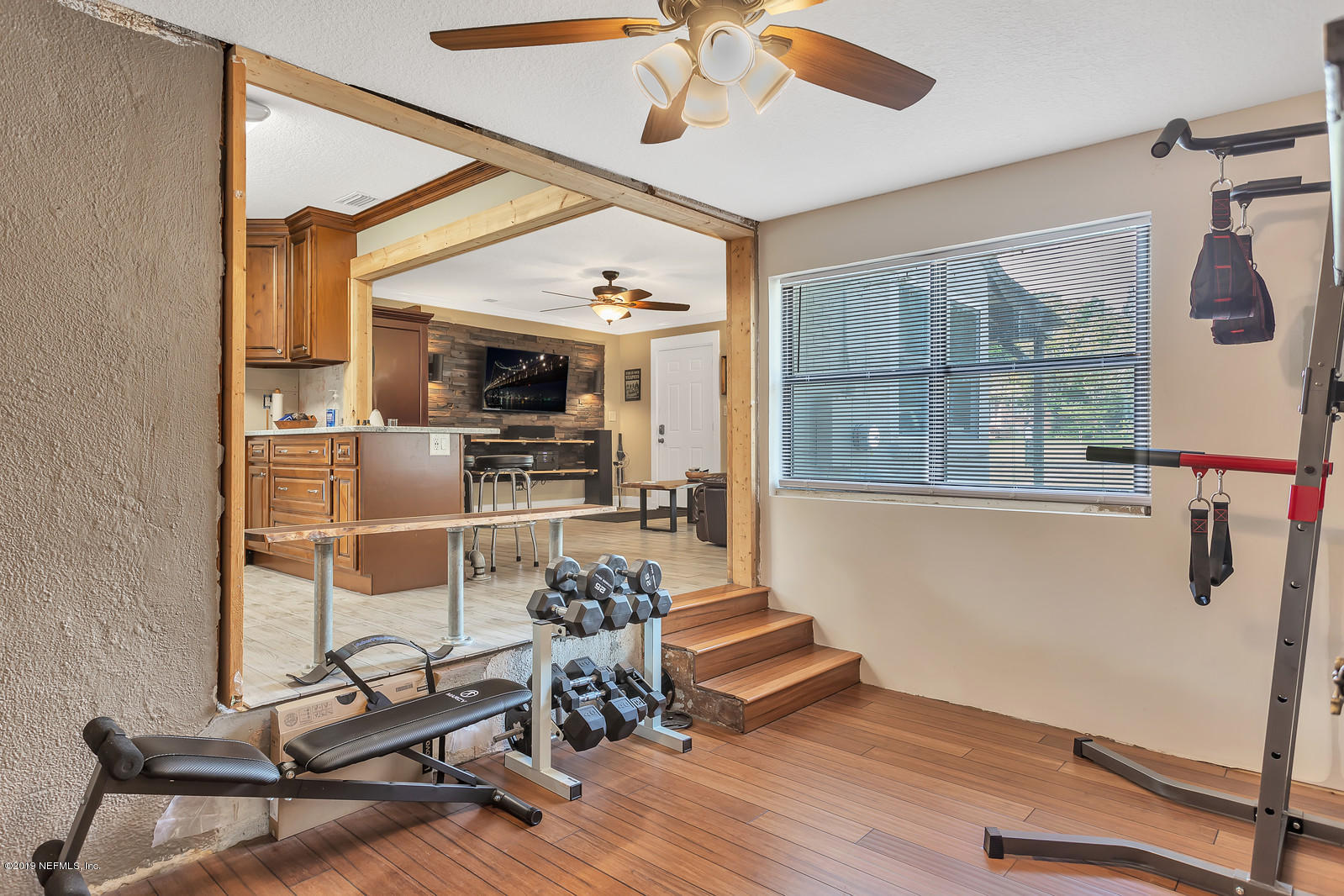 9767 Lily Road Jacksonville, FL 32246 - Photo 11 of 29 a view of a room with gym equipment