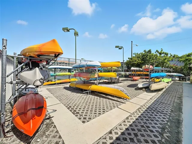 an aerial view of a house with pool patio and outdoor seating