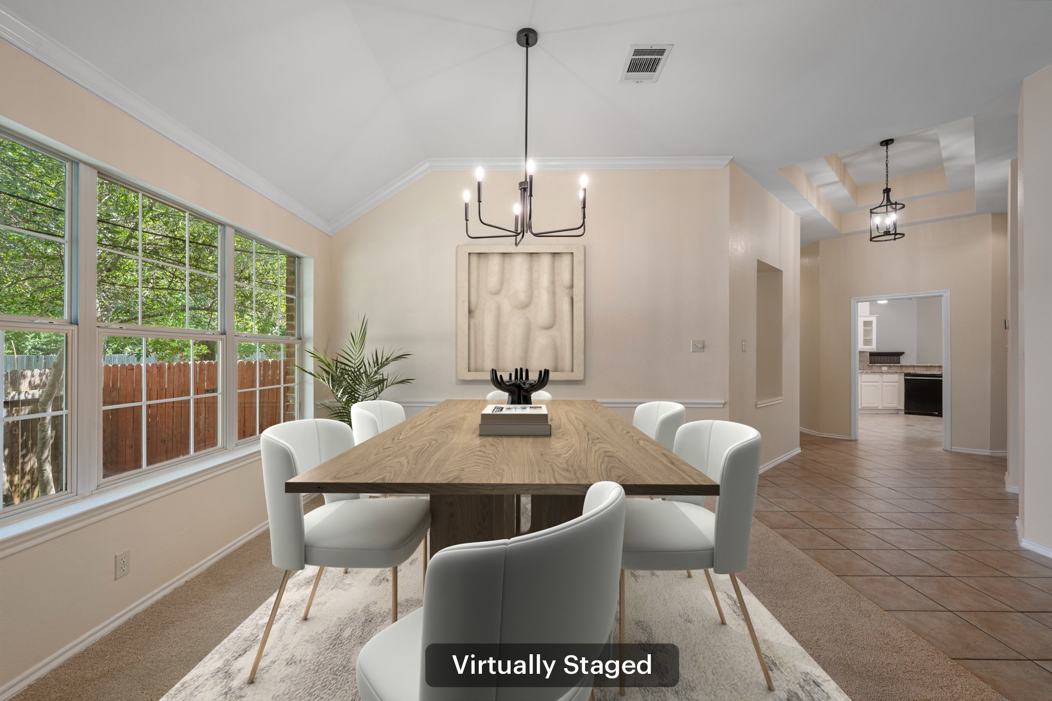 1600 Colton Way Cedar Park, TX 78613 - Photo 6 of 34 A striking chandelier illuminates this inviting dining area, perfect for entertaining.