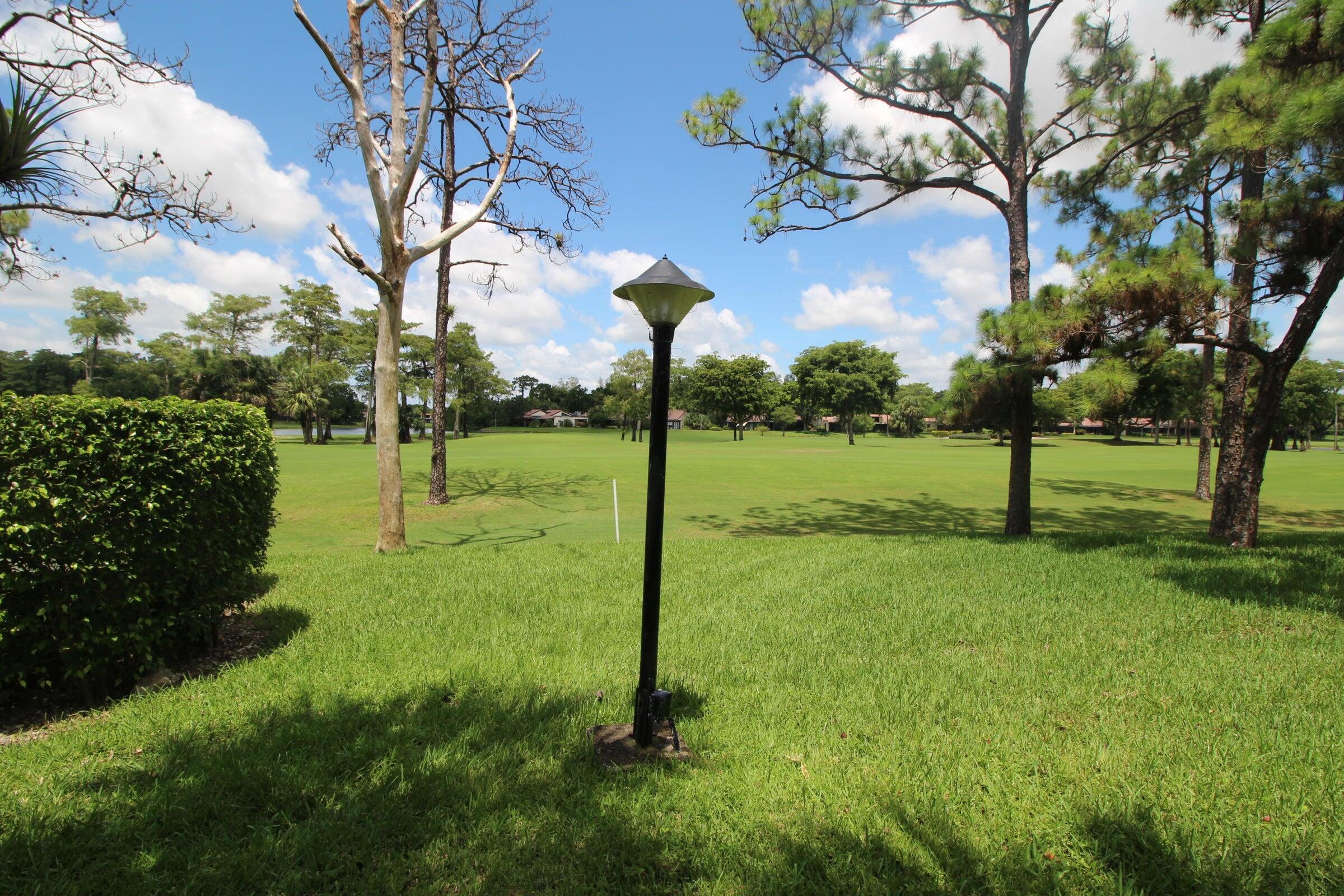 21766 Cypress Drive, Unit 20A Boca Raton, FL 33433 - Photo 17 of 21 a view of a park