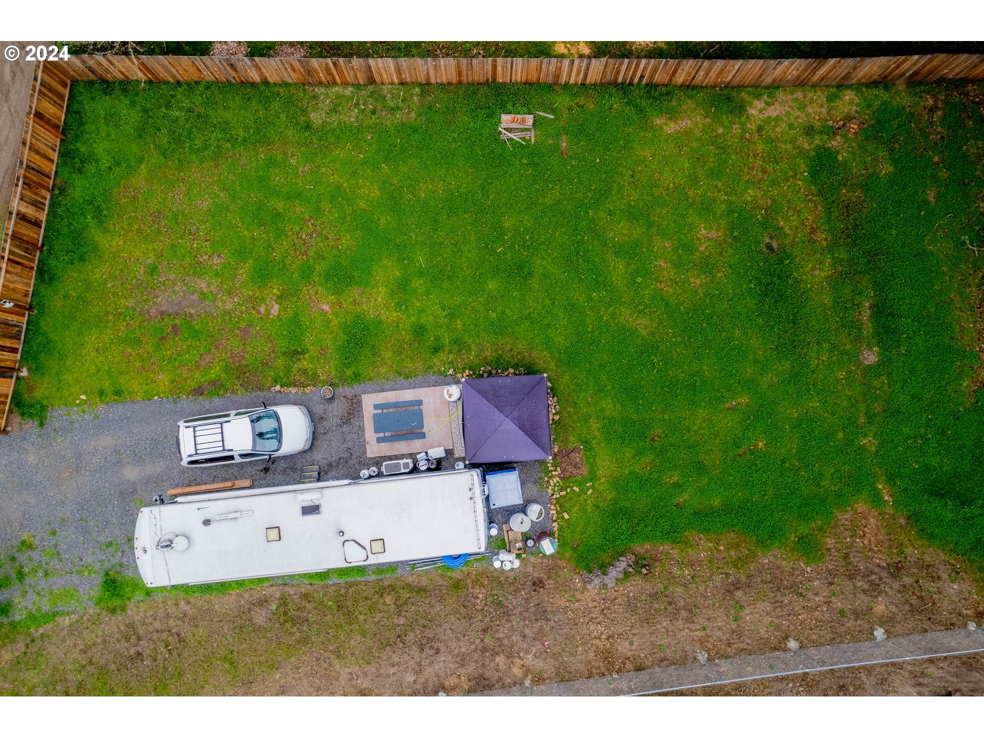 56th Avenue Sweet Home, OR 97386 - Photo 13 of 20 a view of a backyard with a garden