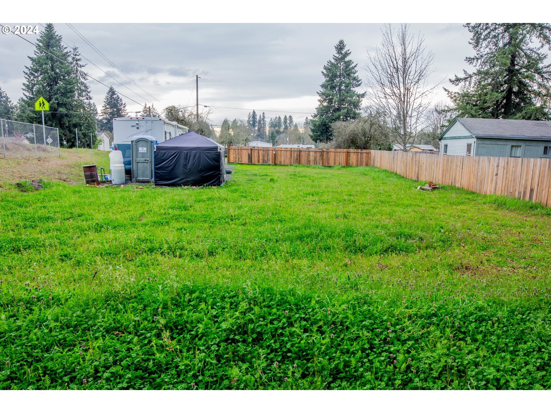 56th Avenue Sweet Home, OR 97386 - Photo 5 of 20 a view of a backyard with a garden