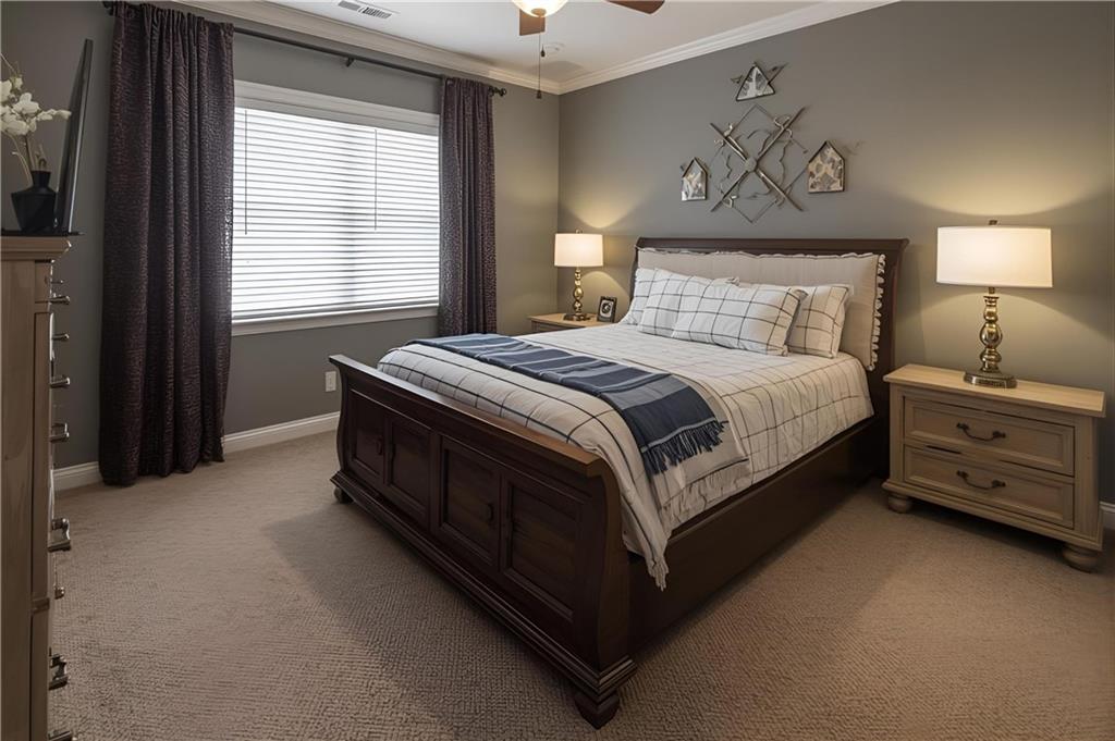 2303 Wingfoot Place Decatur, GA 30035 - Photo 7 of 10 a spacious bedroom with a bed and a window