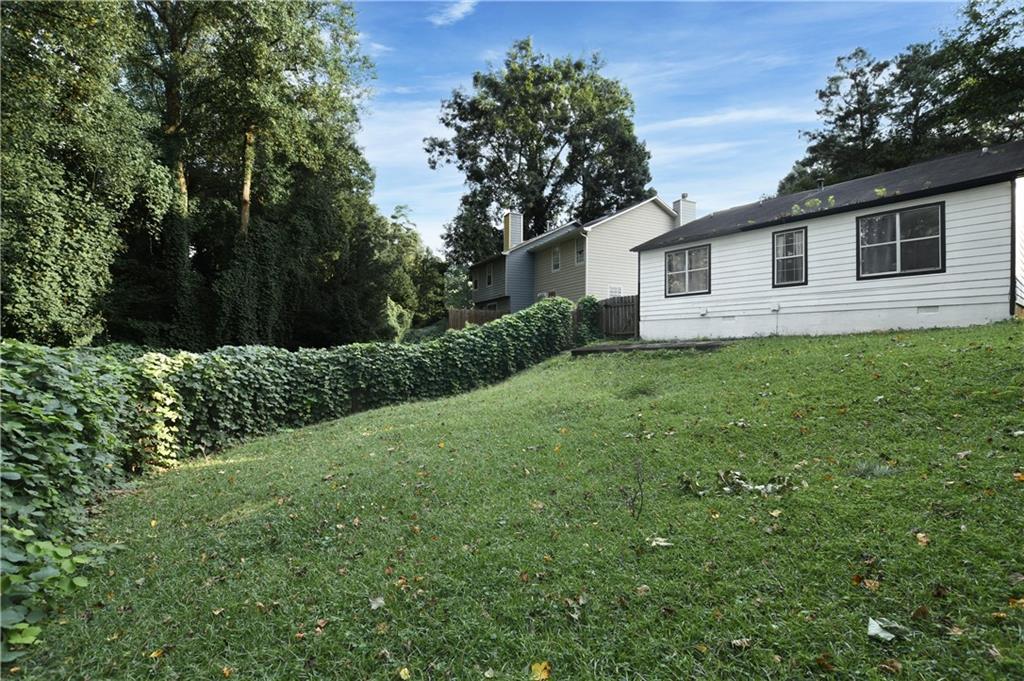 2303 Wingfoot Place Decatur, GA 30035 - Photo 10 of 10 a house view with a garden space