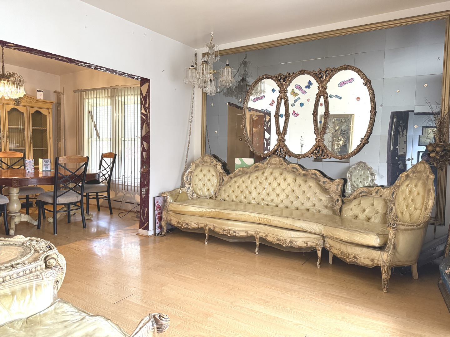 1146 West 88th Street Chicago, IL 60620 - Photo 2 of 23 a living room with furniture a fireplace and a large mirror