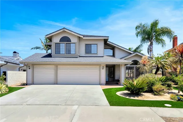 a house view with a garden space
